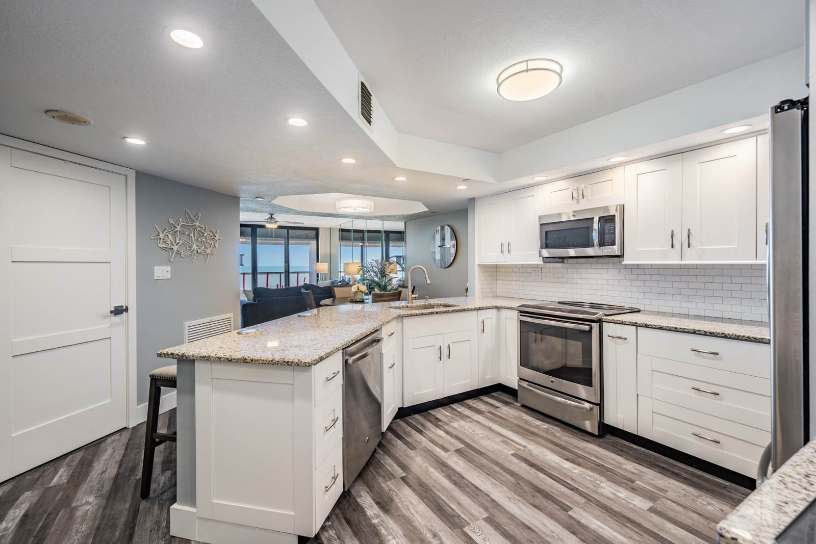 Renovated open kitchen and living area, Unit 19B